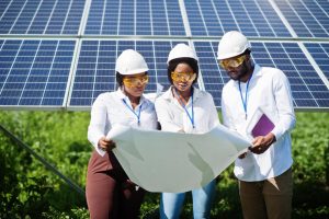 african-american-technician-checks-maintenance-solar-panels-group-three-black-engineers-meeting-solar-station
